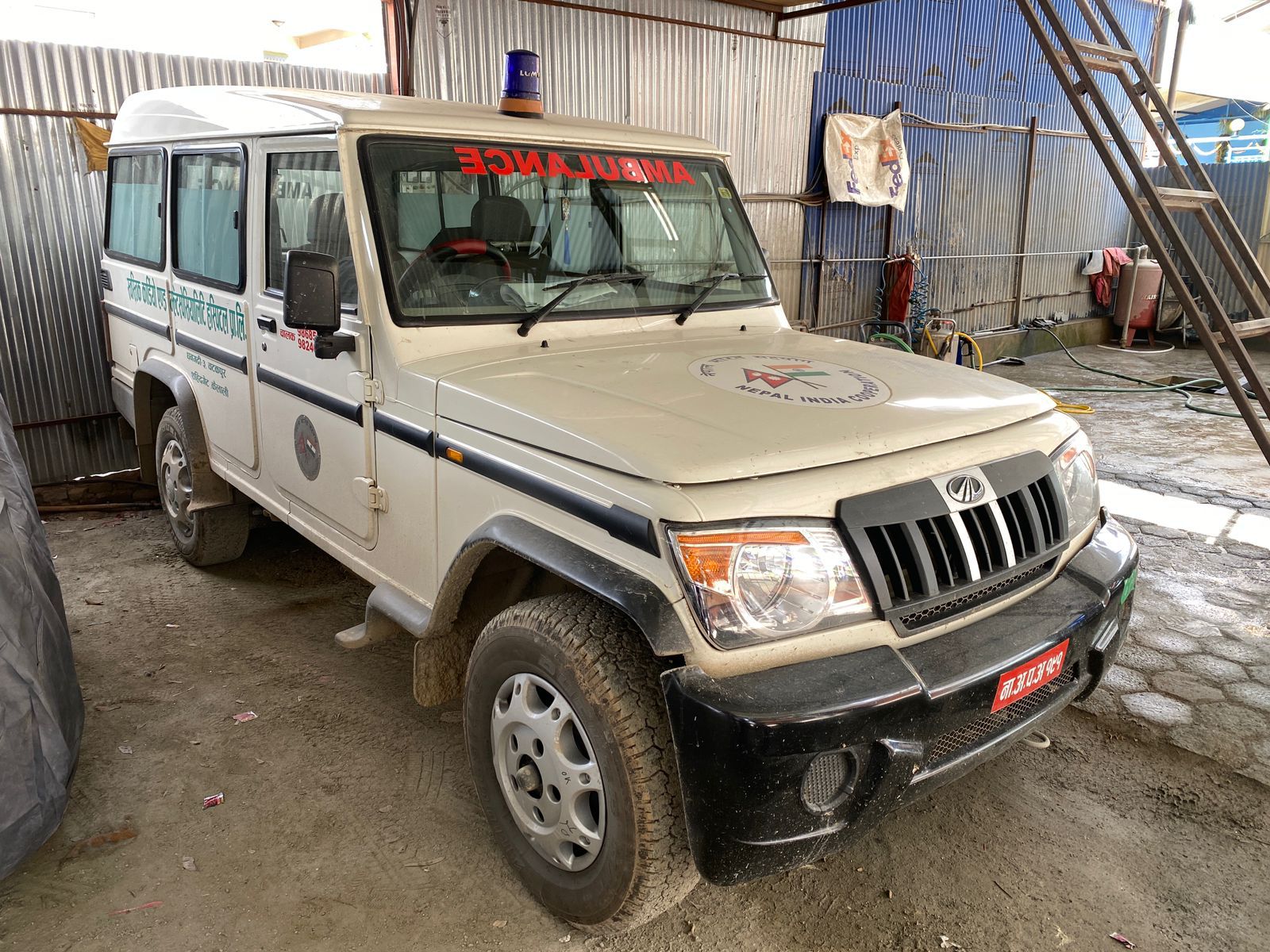 Medical professionals with ambulance